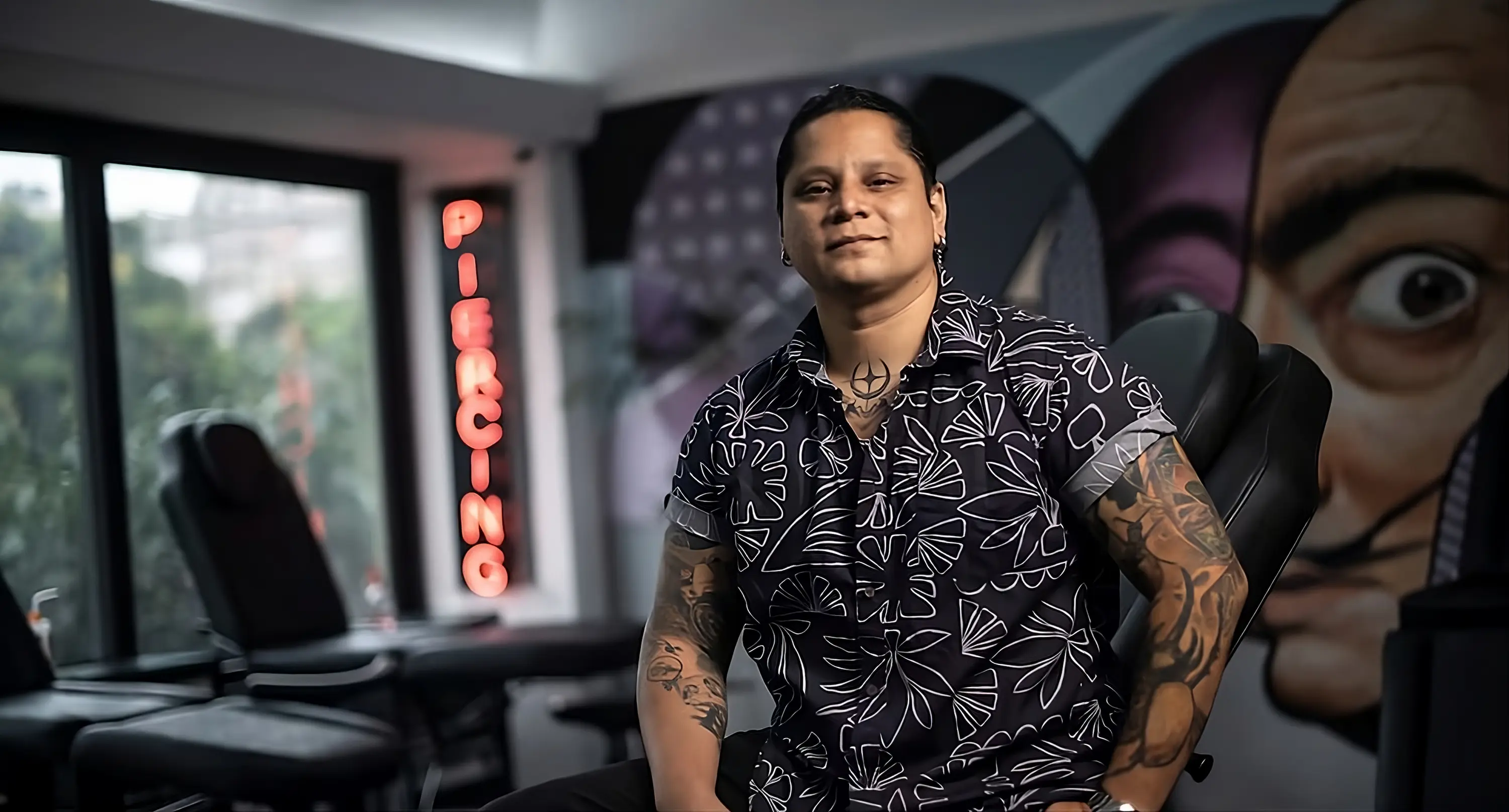 Portrait picture of César Pinto posing at Ganga Tattoo Studio Los Angeles
